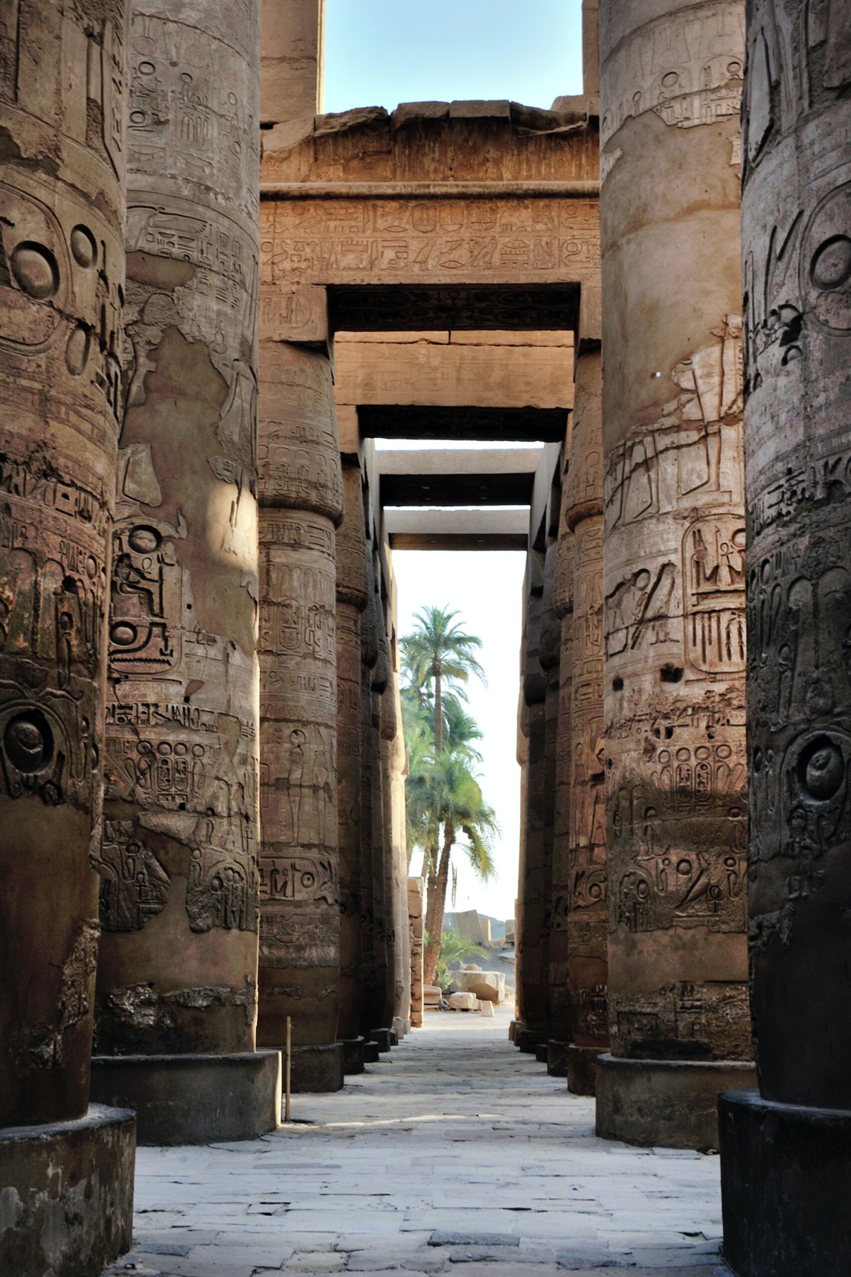 A-view-of-the-karnak-temple-showing-columns-and-palm-trees-in-the-vicinity